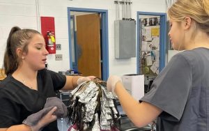 Warren County cosmetology students work in the on-campus salon.