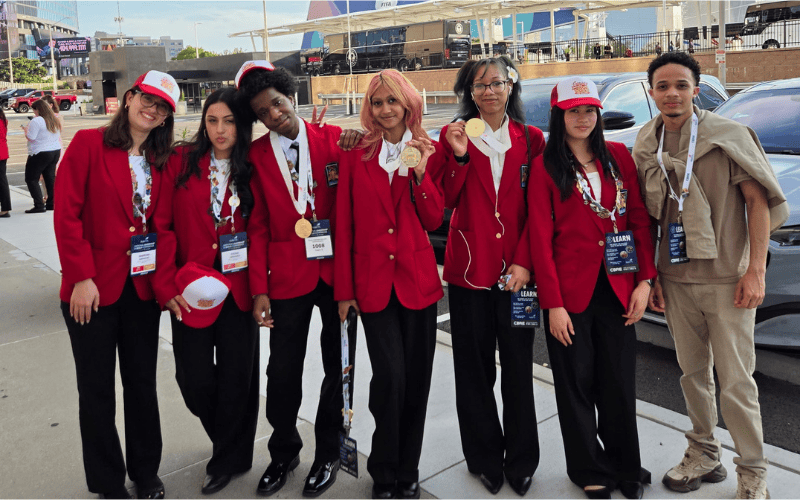Essex County Technical Students stand with their gold medals