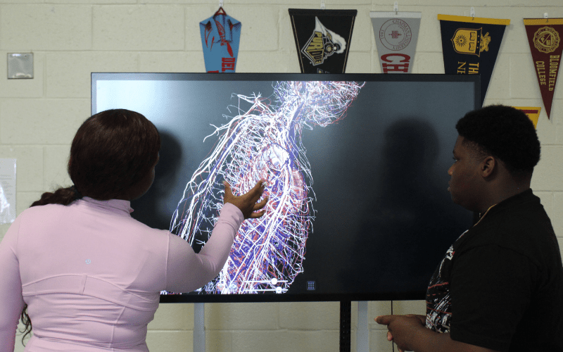 Staff from Burlington County Institute of Technology train using artificial intelligence.