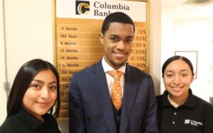 Student works with Columbia Bank Manager