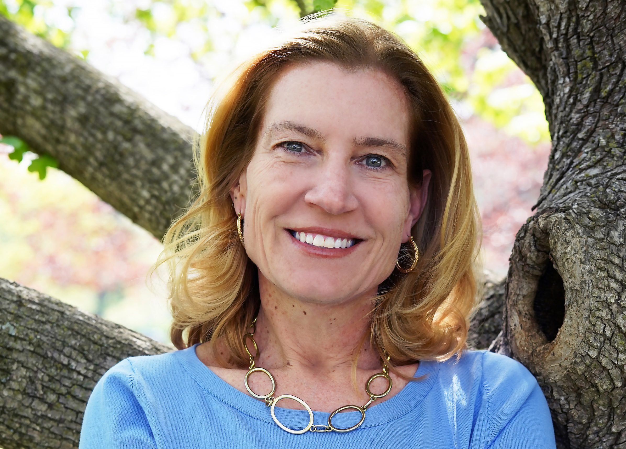 DSC01969 copy810 Jackie Burke smiling leaning on tree