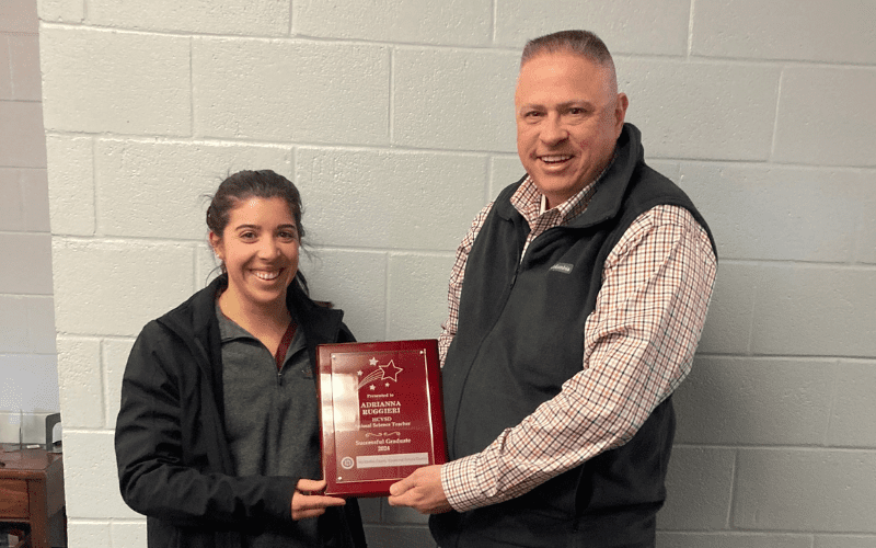 Adrianna Ruggieri receives her successful graduate designation from HCVSD Superintendent, Dr. Todd Bonsall. After graduating from the Hunterdon County Polytech Career and Technical School in 2016, Ruggieri returned in 2022 to begin teaching in the school’s Animal Science program.