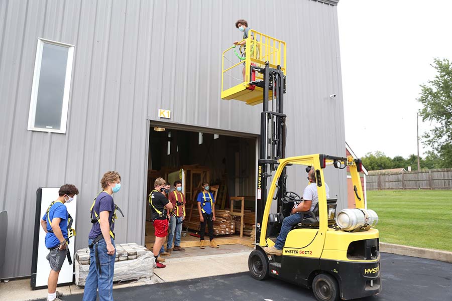 Hunterdon students get hands-on experience with forklift on campus.