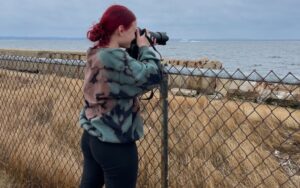 Katie Ackerman, a recent graduate of the Marine Academy of Science and Technology (MAST), part of Monmouth County Vocational School District, takes photos of harbor seals for a project that identifies the seals through facial recognition technology and tracks them.