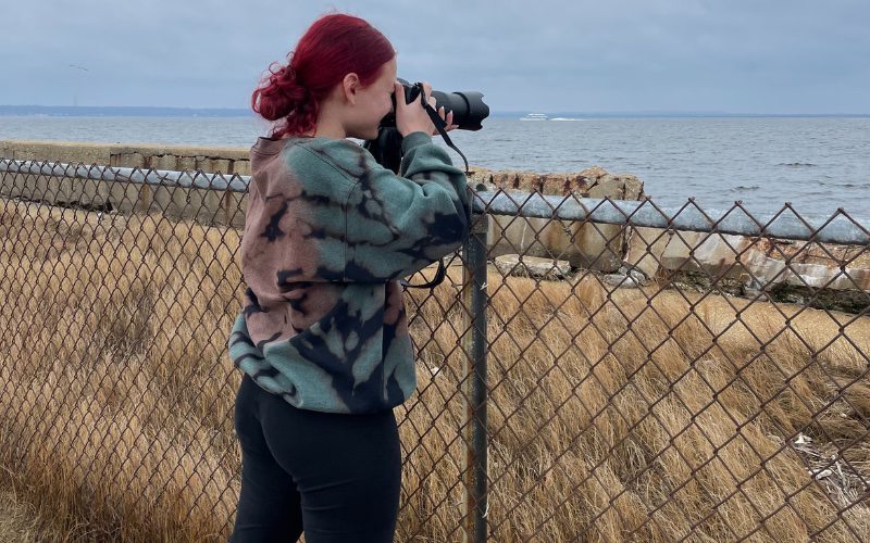 Katie Ackerman, a recent graduate of the Marine Academy of Science and Technology (MAST), part of Monmouth County Vocational School District, takes photos of harbor seals for a project that identifies the seals through facial recognition technology and tracks them.