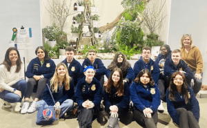 Floriculture students at the Monmouth County Vocational School District in front of their first-place award winning display from the Philadelphia Flower Show.