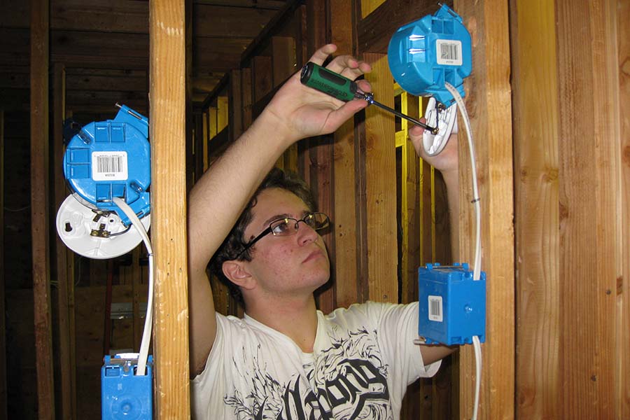 A Monmouth County student practices installing electrical wire.