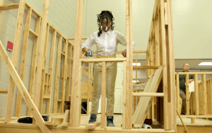Omari Anna Jones, a recent graduate of Essex County Schools of Technology, learned aspects of architectural design and construction science in a classroom with space to construct a replica house from start to finish.