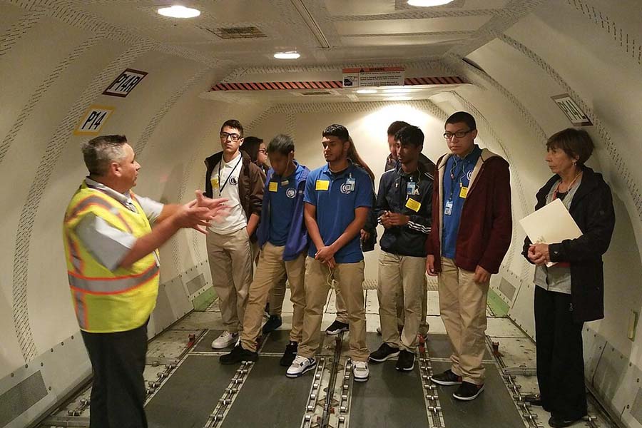 Passaic County students visit FedEX to study logistics, which included a tour of a FedEx plane.