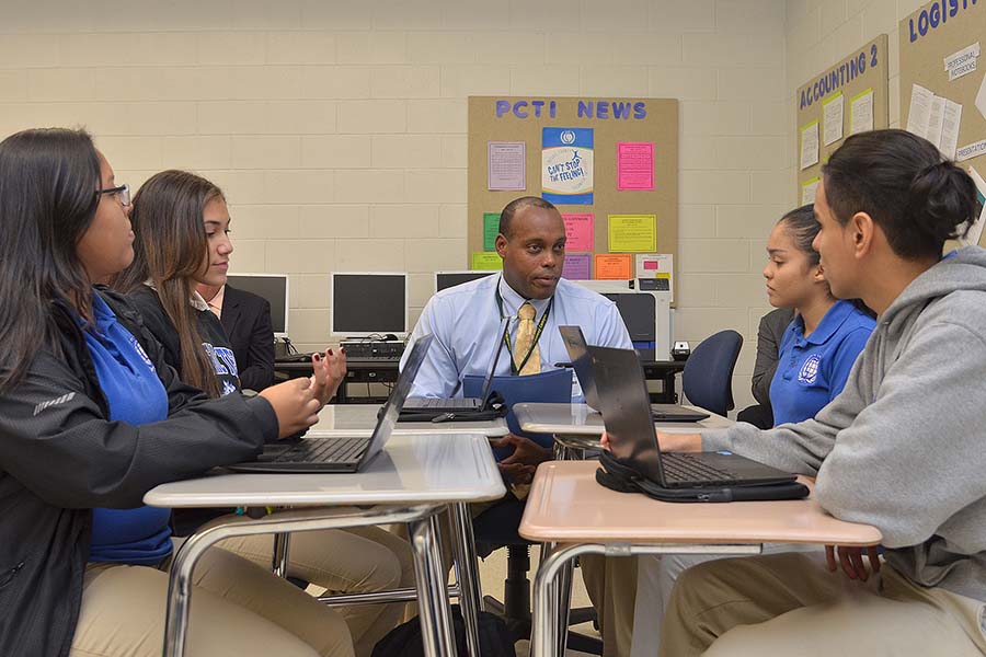 Passaic County students study logistics in a group.