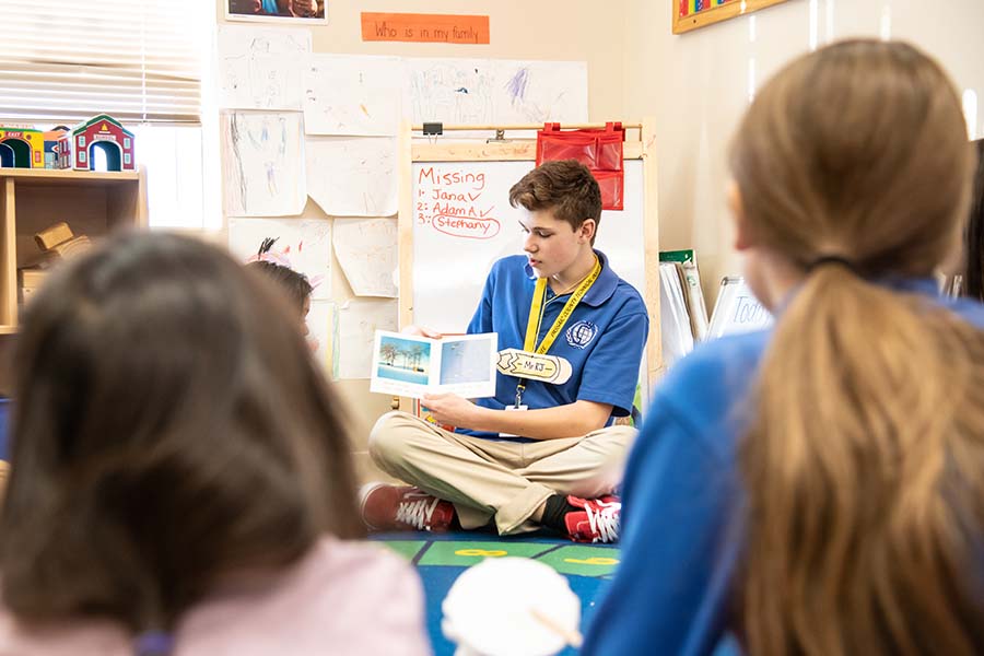 A Passaic County early childhood education student reads to a preschool class.