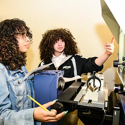 Passaic County manufacturing students practice on high-tech equipment.