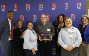 Burlington County Institute of Technology awards Inductotherm with the Business Partner of the Year honor; school leaders present the award