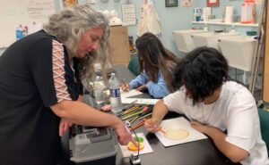 Teresa De Sapio Diaz, a commercial arts and advertising design instructor at Hunterdon County Polytech, helps her students launch freelance design businesses to test out a career as an artist.