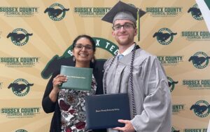 Recent Sussex County Technical School graduate Vincent DiMuccio, right, started taking courses through Sussex County Community College in his sophomore year, giving him the opportunity to earn an associate degree while still in high school. He is pictured with his Sussex Tech counselor, Bina Varkey. 