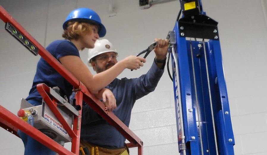 Warren County Technical School - Teacher Helping Student 